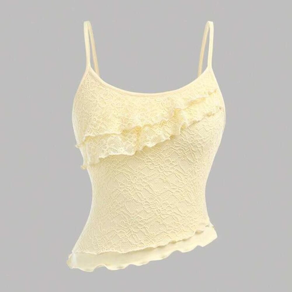 Y2K Cream lace cami top with ruffles and adjustable straps. Size: S
